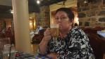 My sweetheart sipping a coffee drink at the restaurant